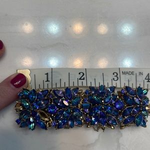 Trifari. Blue and purple rhinestone bracelet with safety chain.  Gold tone